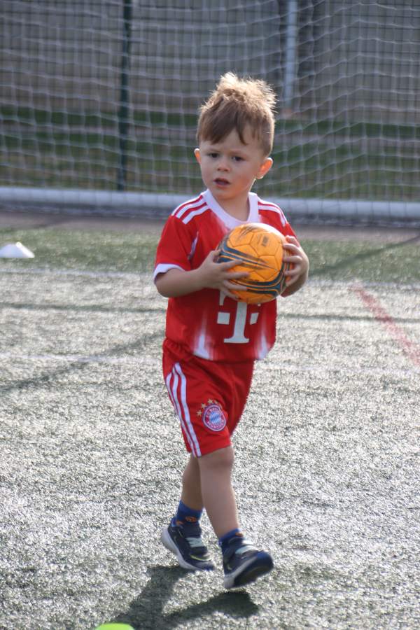 Children at a uSports infant football development centre