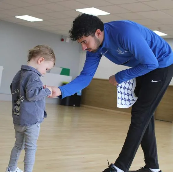 Children at a uSports toddler football class