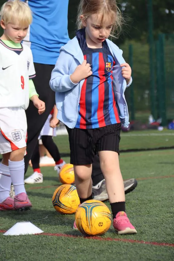 Children at a uSports infant football development centre