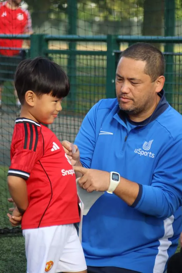 Children at a uSports toddler football class