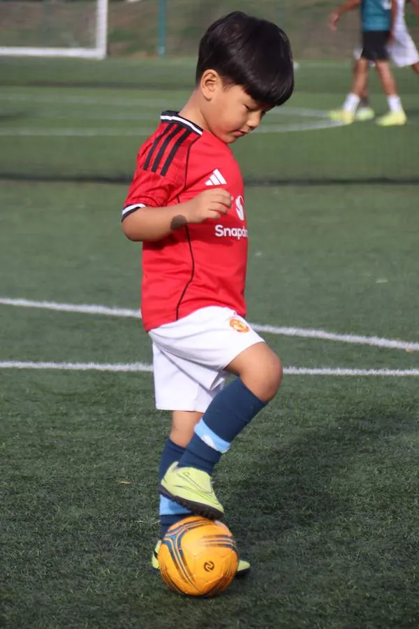 Children at a uSports toddler football class